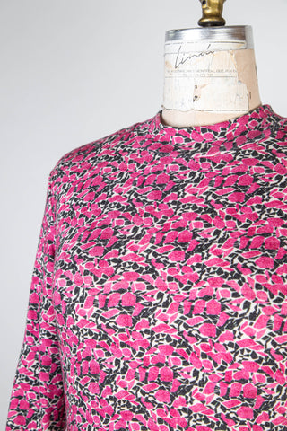 Fitted flared dress with magnolia pink print (M)