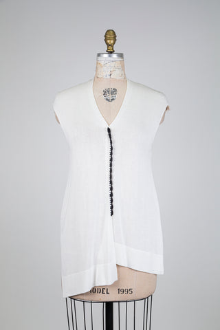 Tunique blanche asymétrique à détail noir (s)