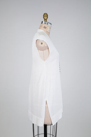 Tunique blanche asymétrique à détail noir (s)