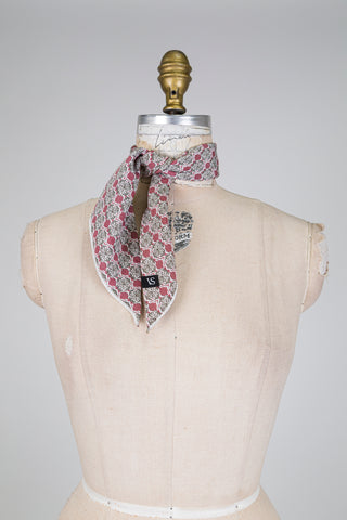 Foulard triangle à motif rouge brique et vert-de-gris