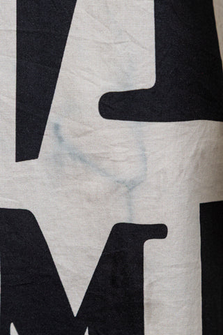 Cream wrap dress with black graphic lettering (M)