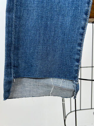 Skinny denim pants with a worn effect and clean cuts (30 and 31)