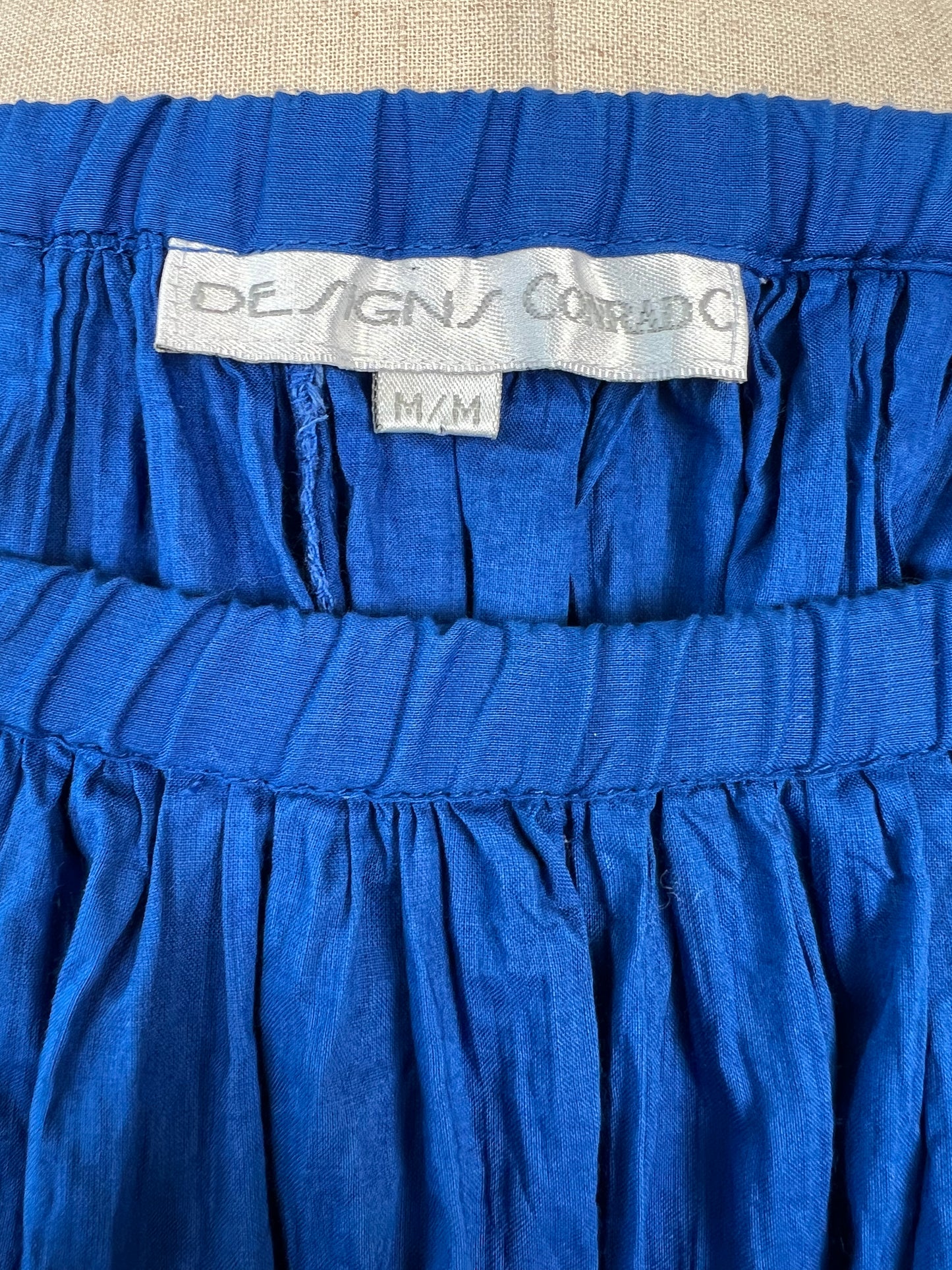 Jupe vintage plissée bleu cobalt à broderies (XL)