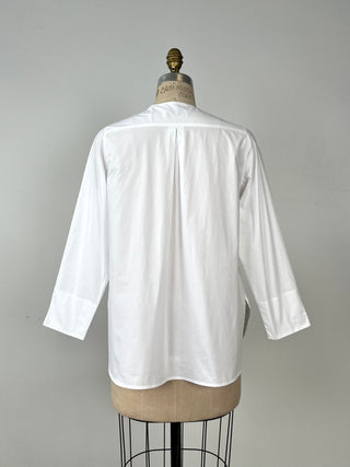 Blouse en coton blanc à plastron broderies (XS)