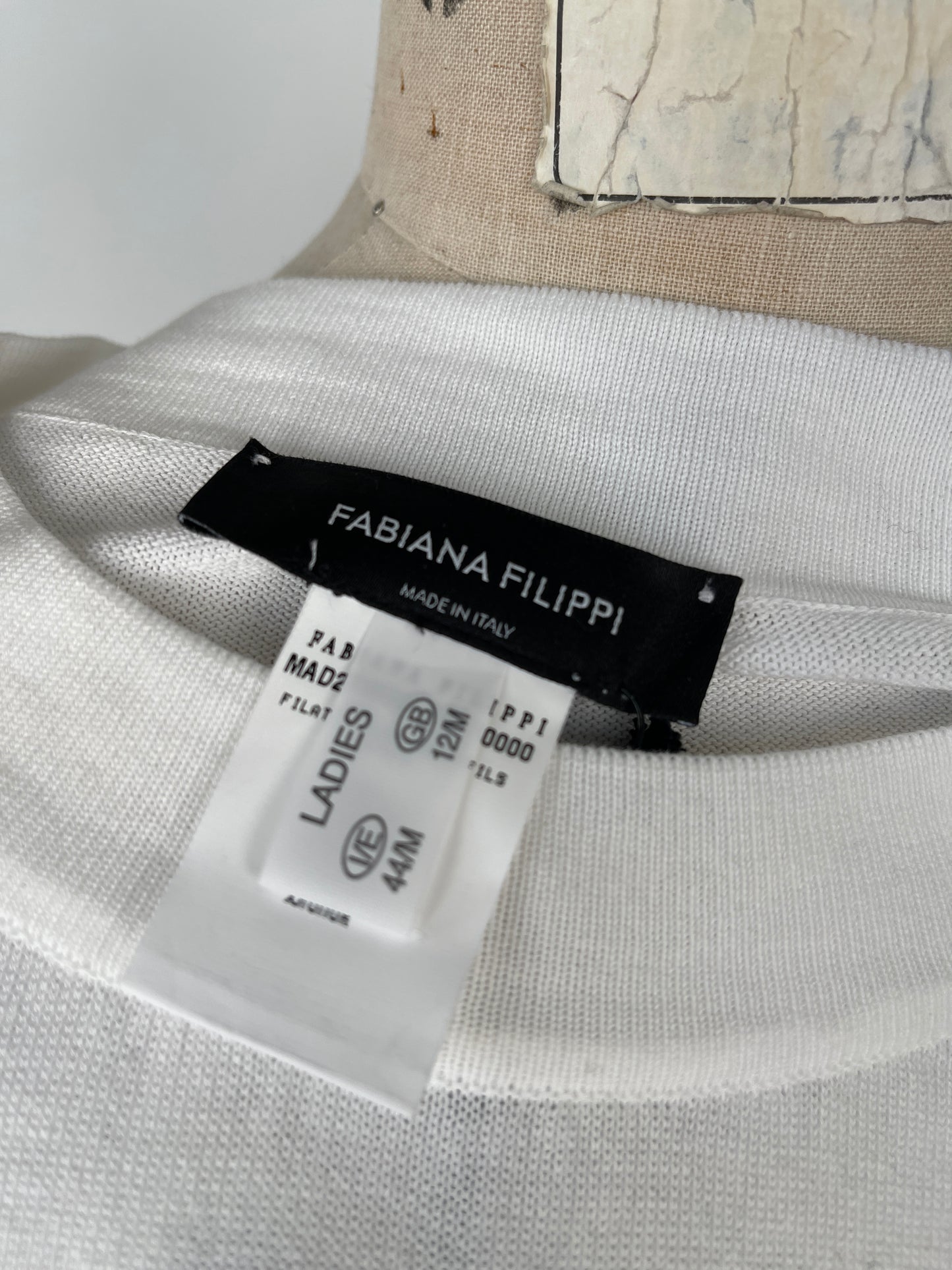 Chandail en tricot blanc à manches décoratives (L/XL)