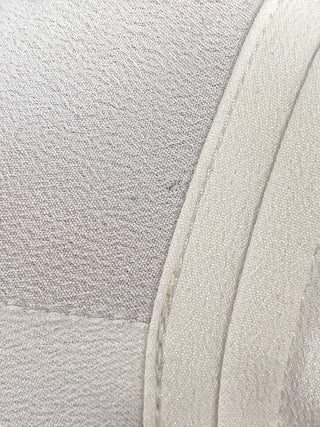 Blouse ivoire à col ajouré et pli rond drapé (10+14)