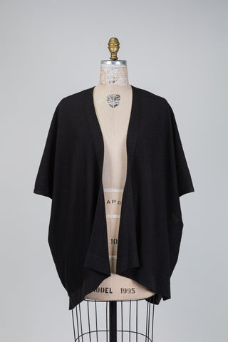 Loose-fitting black cardigan with a subtle shimmer (6)