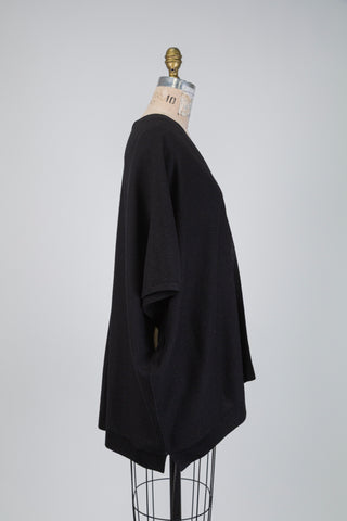 Loose-fitting black cardigan with a subtle shimmer (6)