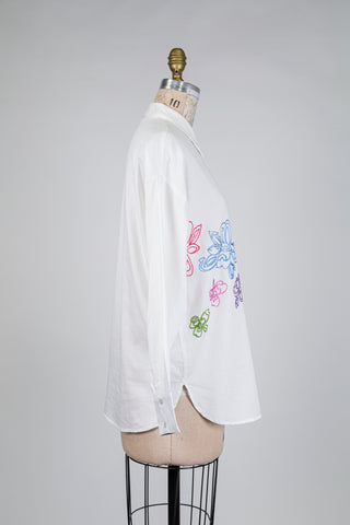 White blouse with embroidered flowers (6 to 10)
