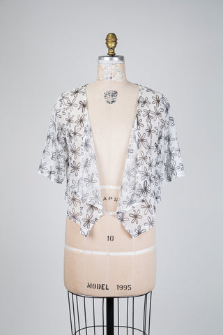 Veste en tulle floral blanc et noir (10⁺)