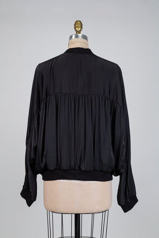 Bomber noir satiné à manches chauve-souris (XL)