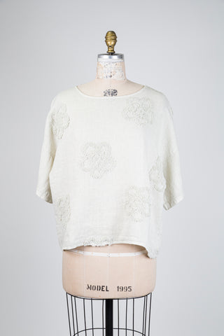 Beige top with floral relief (M to XL)