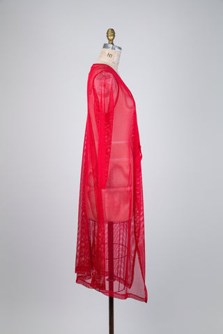 Veste en maille filet rouge (10+)