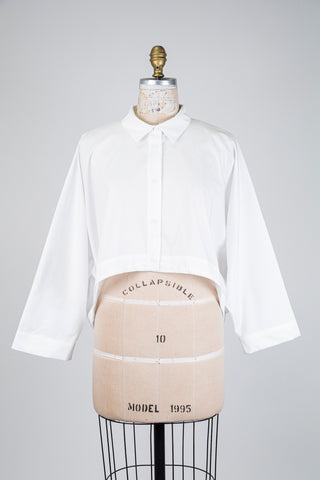 Chemisier blanc coupe high low (S/M)
