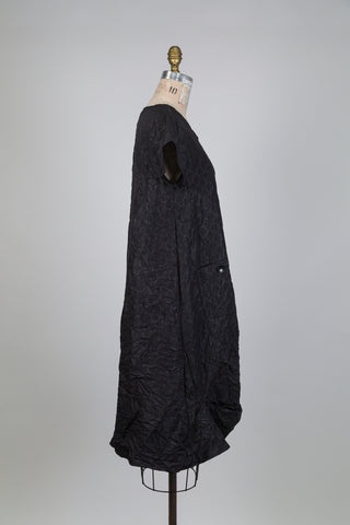 Black dress with ruched front and wavy pattern (S)