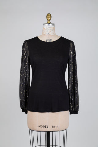 Chandail noir à manches diaphanes lingots d'or (6)