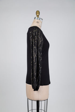 Chandail noir à manches diaphanes lingots d'or (6)