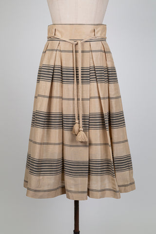 Jupe trapèze beige à plis marqués (XS+M)