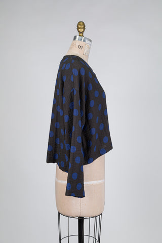 Charcoal black top with blue polka dots (10+)