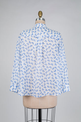 Chemisier blanc à motif floral bleu (4+6)