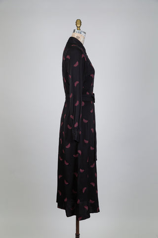Robe chemisier noire et plume (4+6)