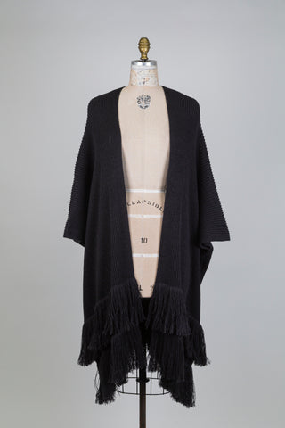 Poncho en tricot côtelé noir à franges (TU)