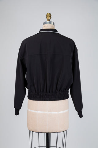 Black bomber jacket with contrasting polo collar (6-8-12)