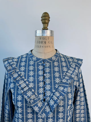 Blue denim-style blouse with bibs and floral embroidery (XXS)